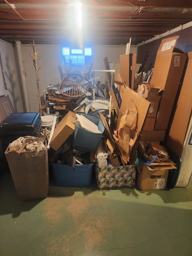 Roll-off dumpster container at job site for 2 Yard Dumpster Rental in North Salt Lake